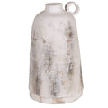 White distressed ceramic vase on a white background