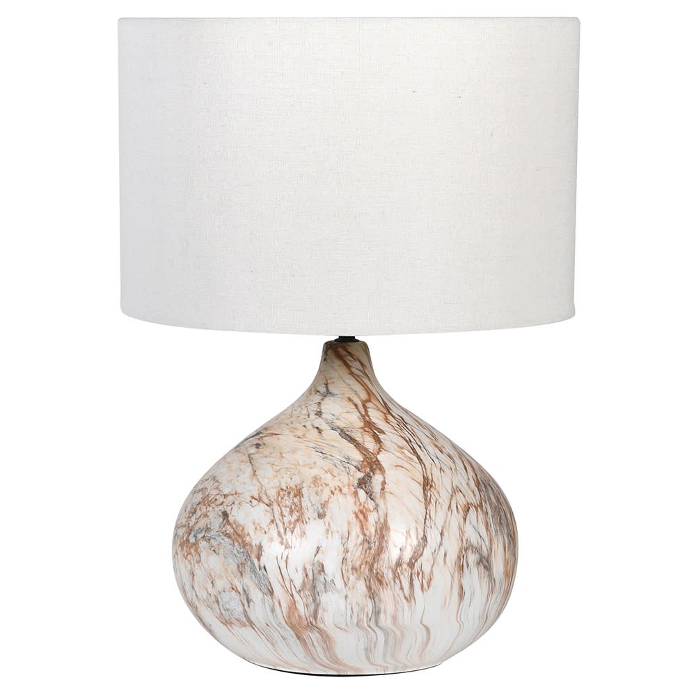 Table lamp with marble base and white shade on a white background