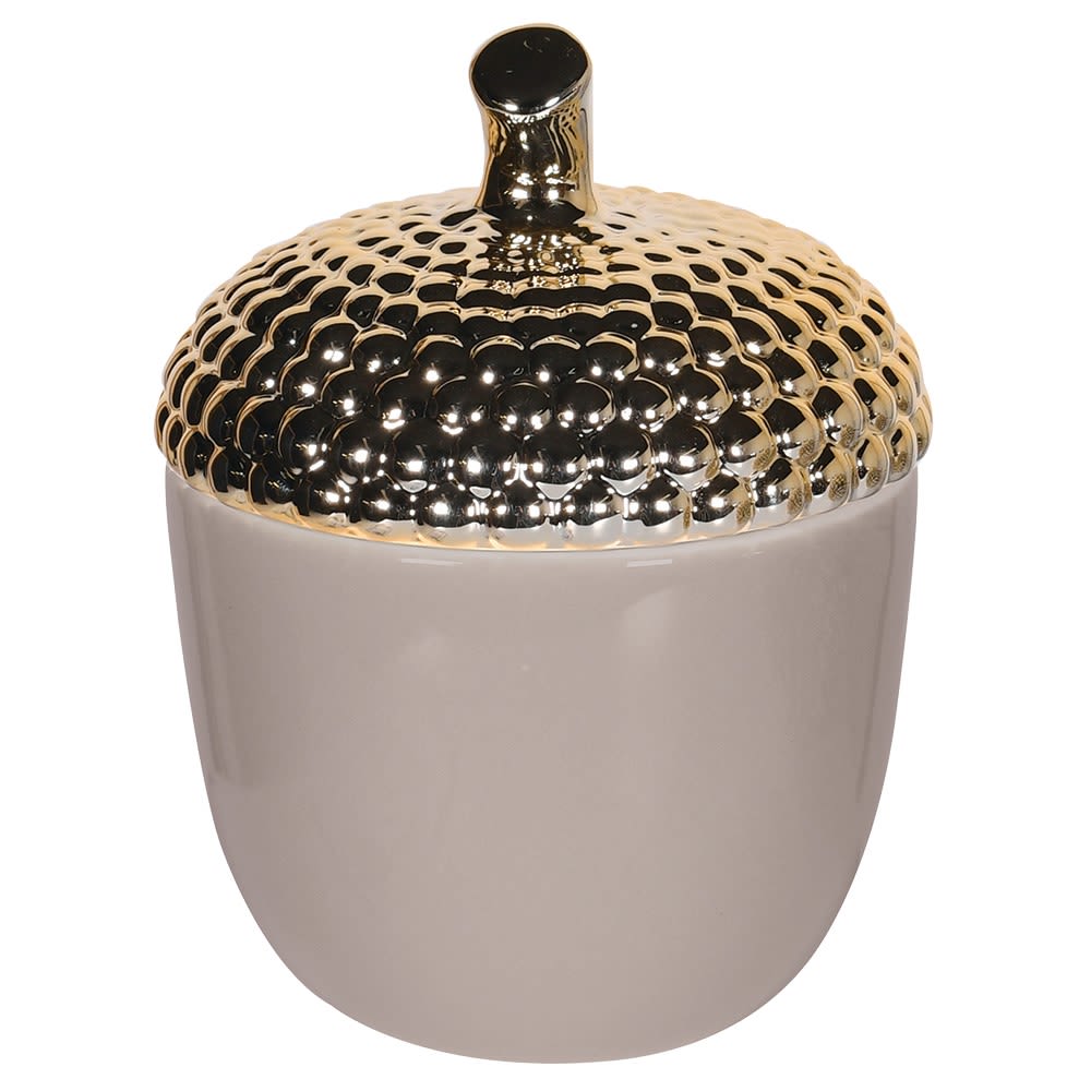 Decorative container with a gold lid on a white background
