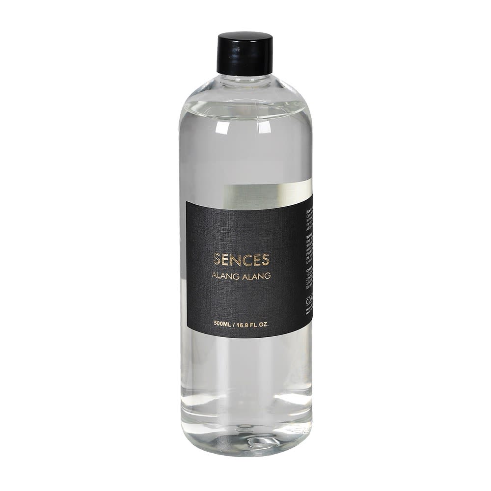 Clear bottle with black cap and label on a white background