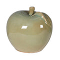 Ceramic apple-shaped container on a white background