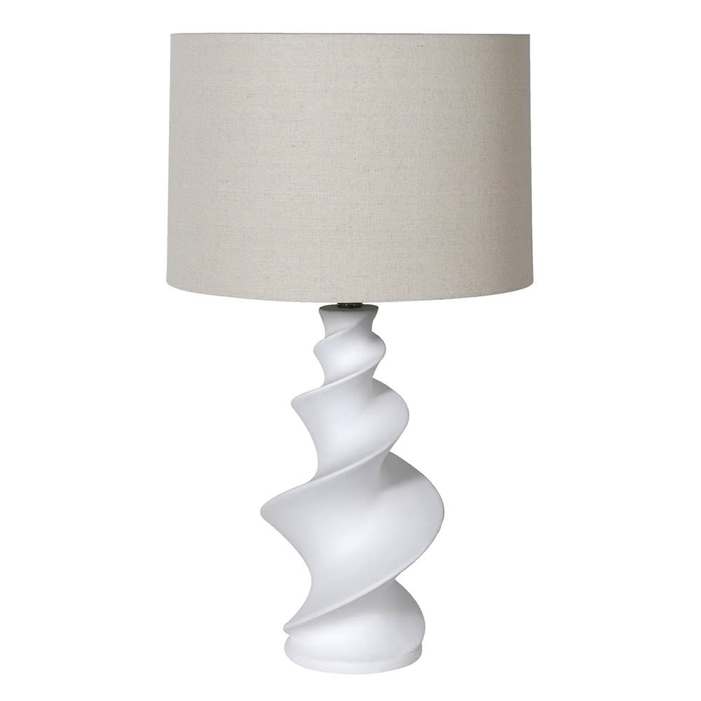 Table lamp with a white spiral base and beige lampshade on a white background
